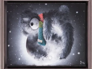 Framed painting with a plush bear holding a moon in black